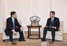 駱惠寧會見梁振英 就推進社會重返正軌交流