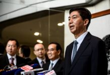 骆惠宁指一国两制进入50年不变中期 积累的矛盾逐步显现