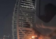 首輪遇襲後的24小時:阿聯酋國防部公布攔截數據,迪拜地標遭波及,國際機場受損停運